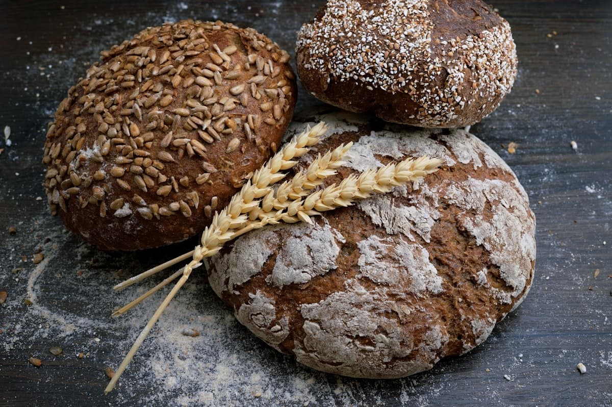 Artisan baker shaping fresh dough by hand